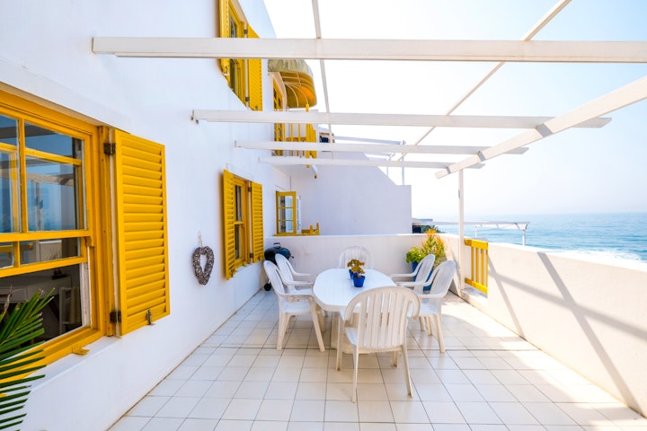 North Coast Accommodation at Santorini Perissa Beach Front | Viya