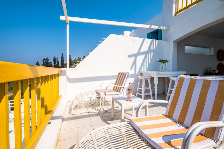 North Coast Accommodation at Santorini Perissa Beach Front | Viya