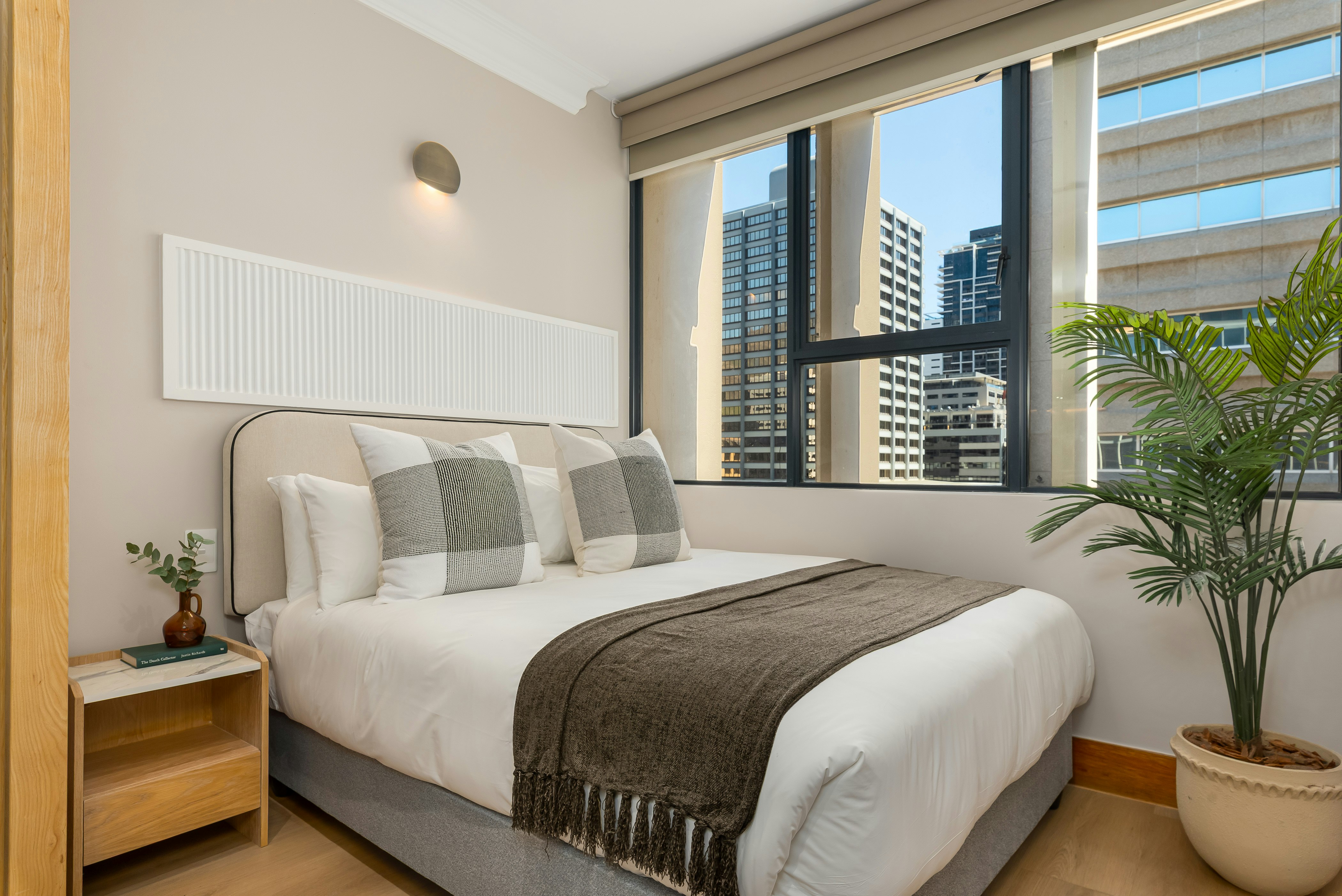Charlie and the Chairman | Designer CBD Apartment image no 1 of 12
