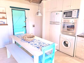 Struisbaai Accommodation at Zandtorini Seaside Cottage | Viya